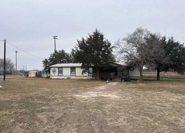 4-bedroom rental at 105 East St in Stockdale, TX — photo 1