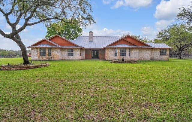 4-bedroom rental at 2112 Eichman Rd in Poteet, TX — photo 1