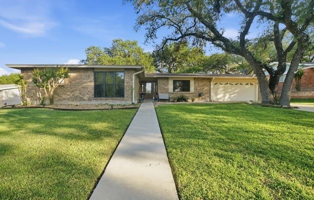 4-bedroom rental at 1299 Cibolo Trl in Universal City, TX — photo 1