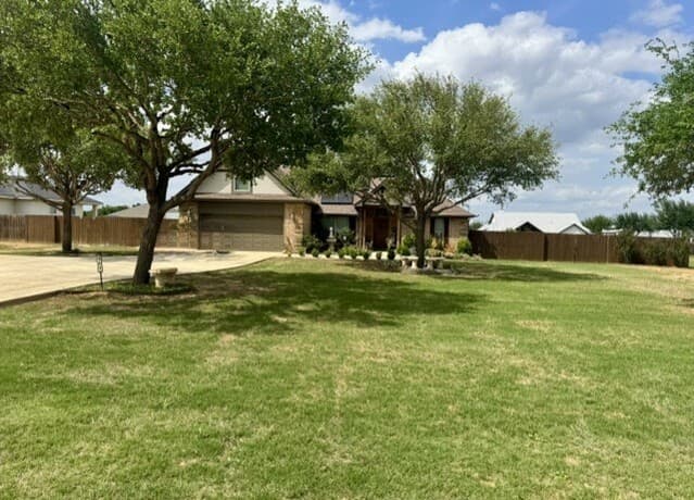 5-bedroom rental at 157 W Medium Meadow Dr in Lytle, TX — photo 1
