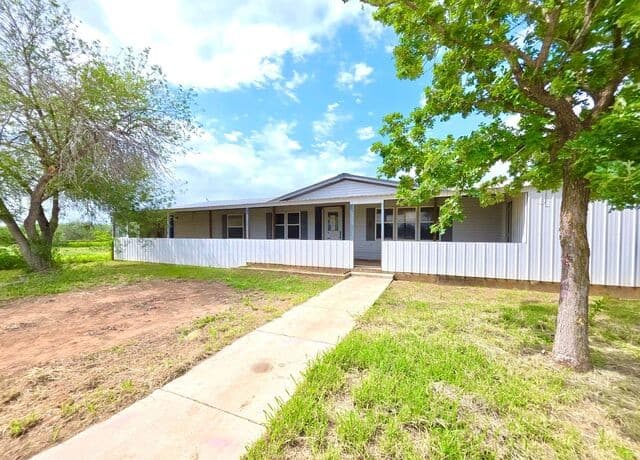 4-bedroom rental at 635 E Ditto Rd in Poteet, TX — photo 1